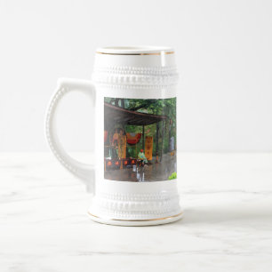 A rainy road in a Chinese folk culture park. Beer Stein
