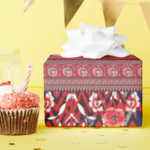 a red and black painting with a red heart on it wrapping paper