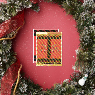 a red and black pattern with flowers on it foil holiday postcard