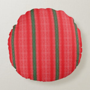 a red and green striped background round pillow