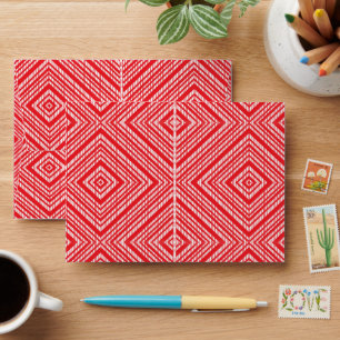 a red and white background with a diamond pattern envelope