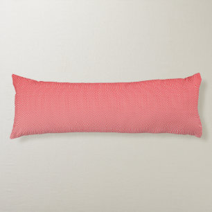 a red and white background with small squares body pillow