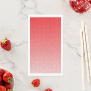 a red and white background with small squares napkin