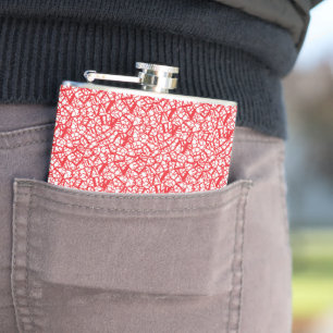 a red and white background with small white dots hip flask