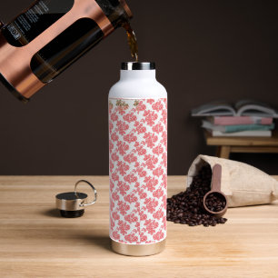 a red and white flower pattern on a white backgrou water bottle