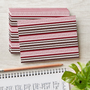 a red and white striped pattern envelope