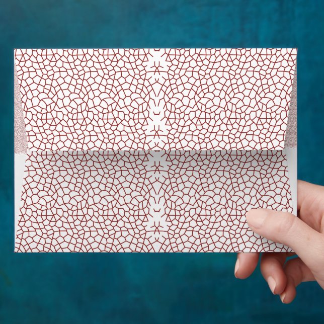 a red and white wallpaper with a pattern on it envelope (Hand)
