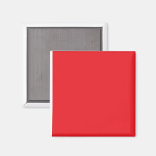 a red background with a white border magnet