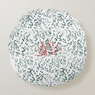 a red flower on a black background round pillow