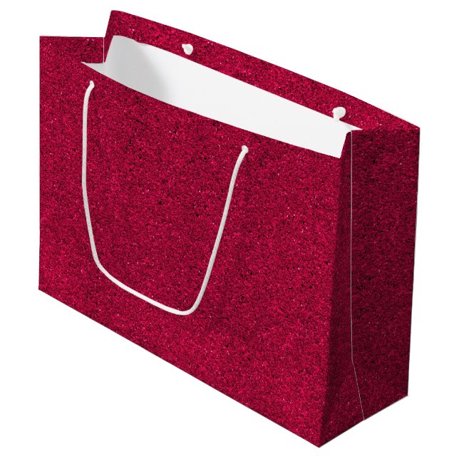 A red glittery gift bag with white handles (Front Angled)
