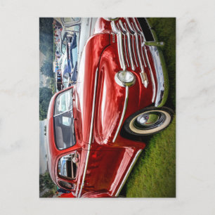 A red Plymouth Special Deluxe Coupe Postcard