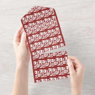 A red rug with a textured pattern is spread out on all in one invitation