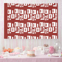 A red rug with a textured pattern is spread out on