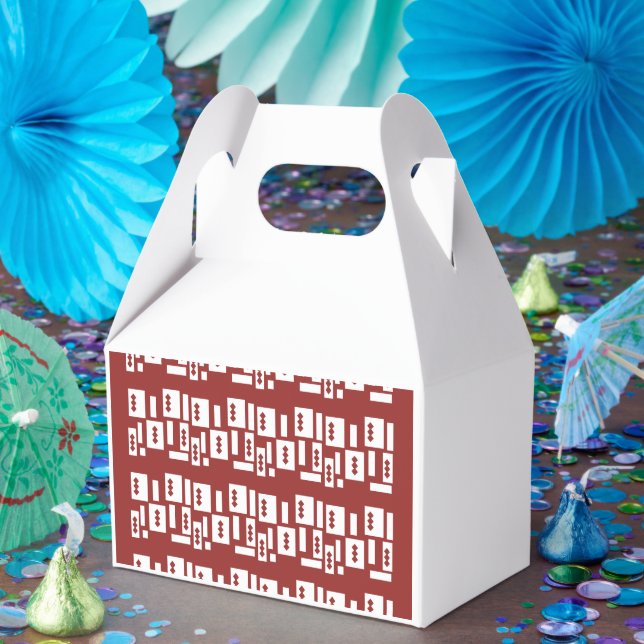 A red rug with a textured pattern is spread out on favor box (Party)