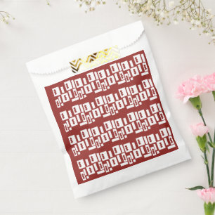 A red rug with a textured pattern is spread out on favour bag