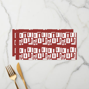 A red rug with a textured pattern is spread out on menu