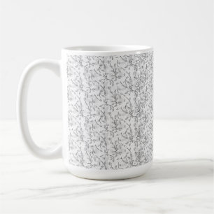 A refined black and white floral motif, highlighti coffee mug