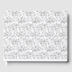 A refined black and white floral motif, highlighti guest book