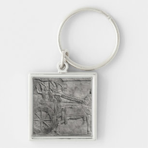 A relief depicting the Assyrian army in battle Keychain