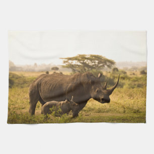 A Rhino with her baby Kitchen Towel