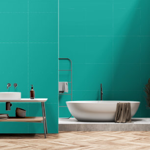 A rich teal green area highlighted by a contrastin wallpaper