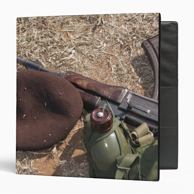 A rifle, military cover and canteen binder (Front/Inside)