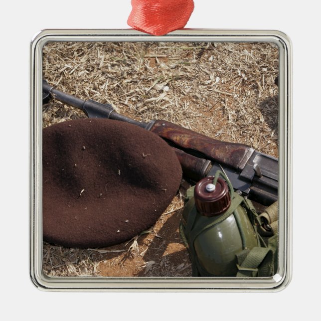 A rifle, military cover and canteen metal ornament (Front)