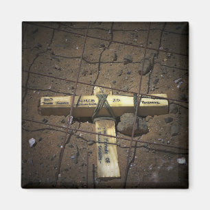 A road repair crew places a cross magnet