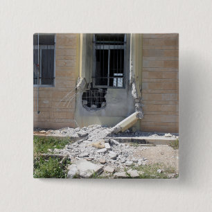 A Rocket Propelled Grenade 2 Inch Square Button