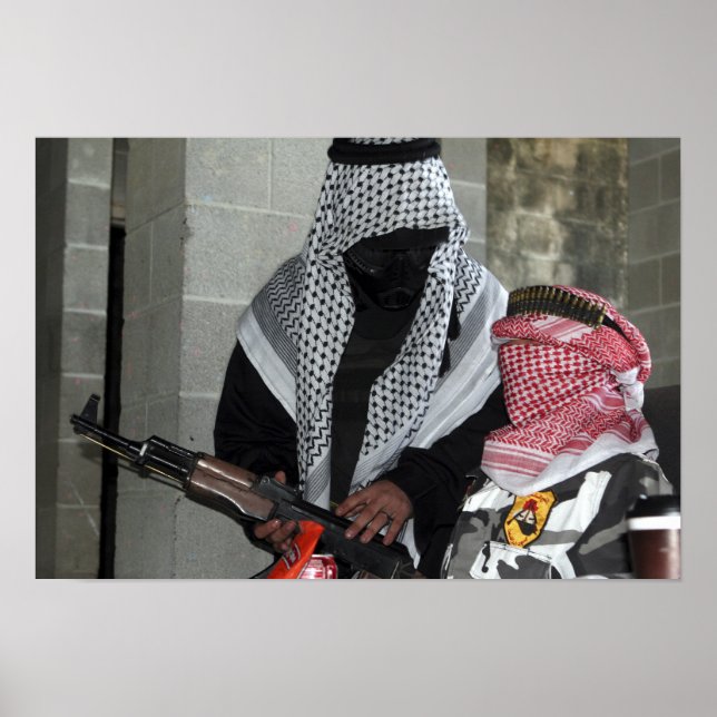 A role-playing enemy aggressor arms a dummy poster (Front)