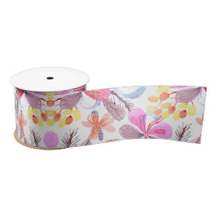 A roll of decorative ribbon with a floral pattern satin ribbon