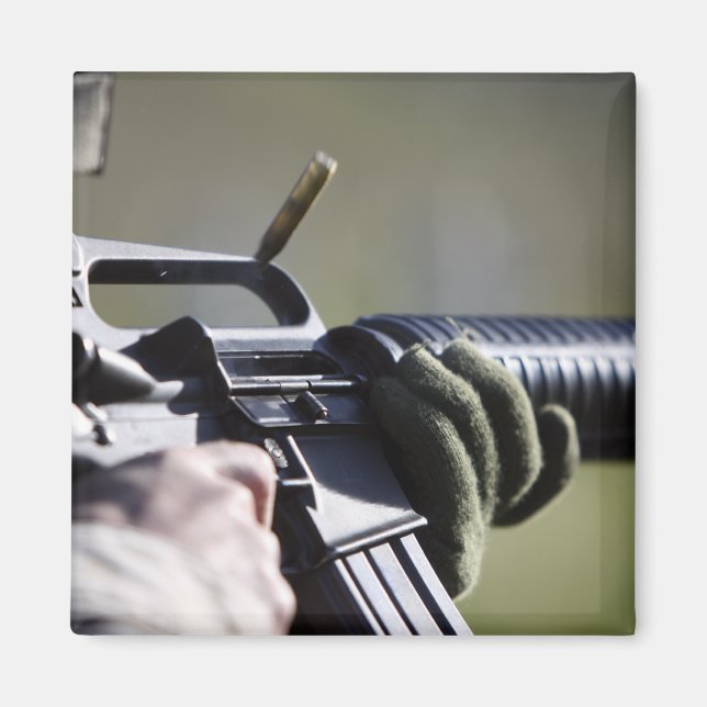 A round flies from the chamber of an M-16A2 Magnet (Front)