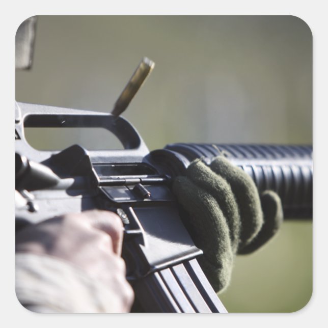 A round flies from the chamber of an M-16A2 Square Sticker (Front)