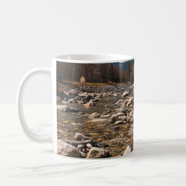 A running stream river with clear water flowing wi coffee mug (Left)