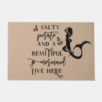 A Salty Pirate and a Beautiful Mermaid Live Here