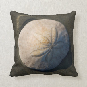 A Sand Dollar On The Beach Throw Pillow