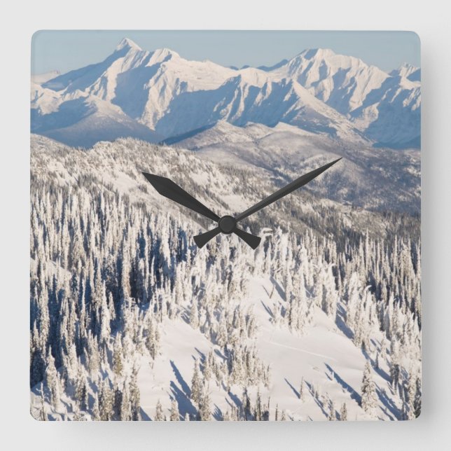 A Scenic View of Snowy Mountains and Trees. Square Wall Clock (Front)