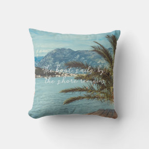 A Seascape with Mountains and a Palm Tree Throw Pillow