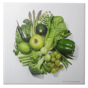 A selection of green fruits & vegetables. tile