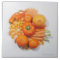 A selection of orange fruits & vegetables.