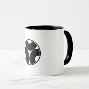a serpentine eye mug