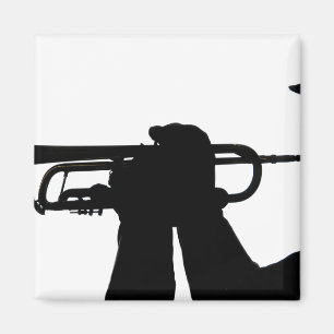 A service member plays a tune magnet