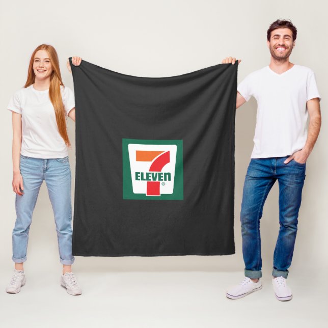 a seven seven logo on a green background fleece blanket (In Situ)
