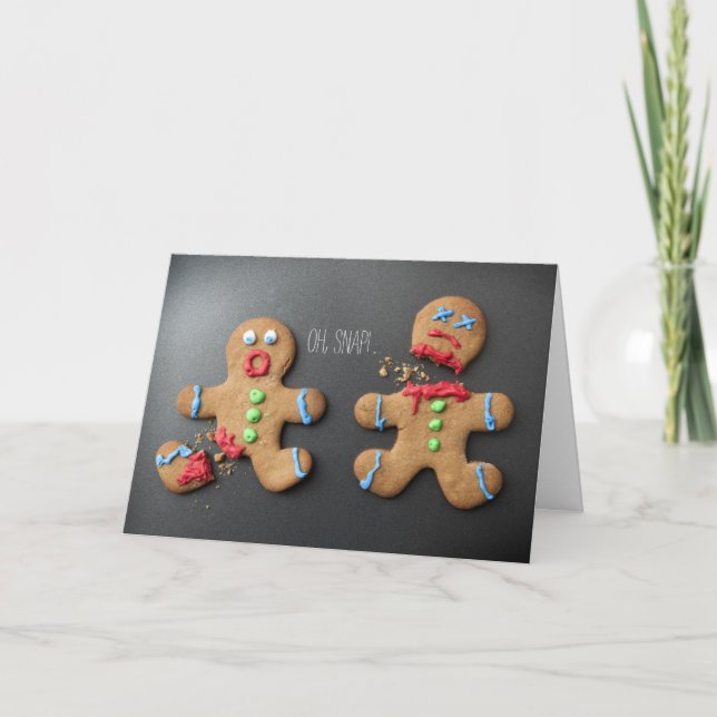A shocked gingerbread man with broken leg holiday card (Front)