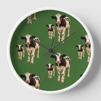 a silly herd of cows on a green background clock