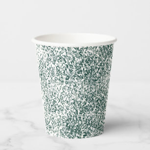 A silver drop splashes into a pool of white liquid paper cups