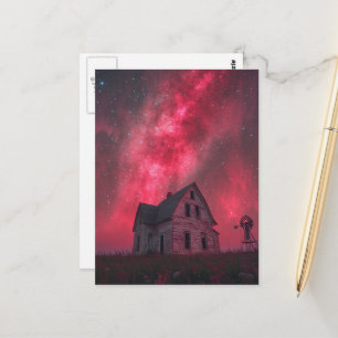 A single abandoned house with the pink night sky postcard