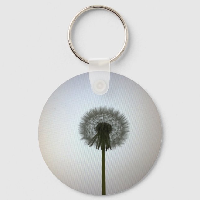 A Single Dandelion Against a White Backdrop Keychain (Front)