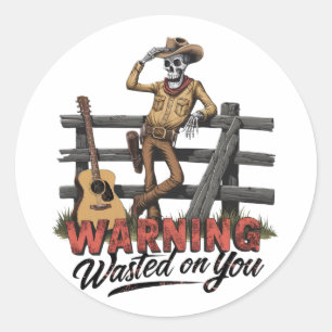 A skeletal cowboy tipping his hat classic round sticker