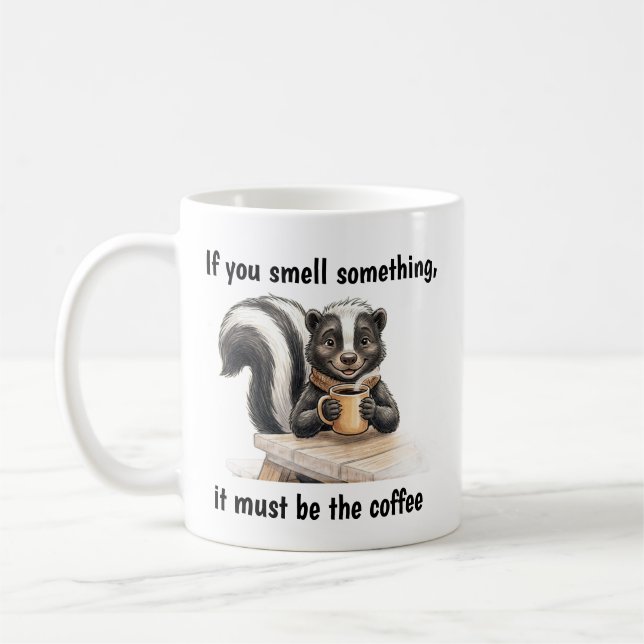 A skunk in denial coffee mug (Left)